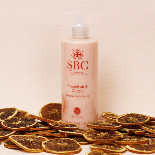 Grapefruit & Ginger Hand & Body Lotion with dried grapefruit slices 