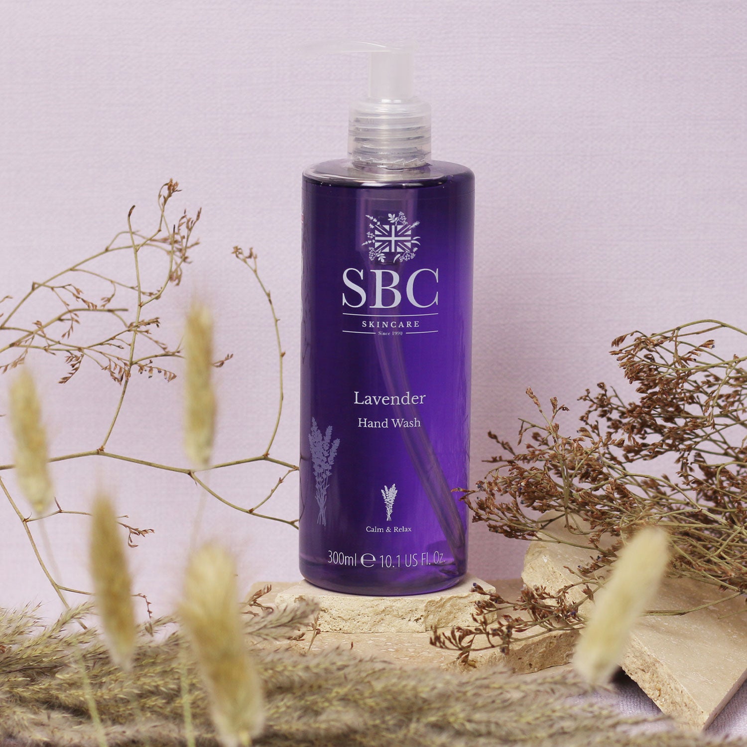 Lavender Hand Wash surrounded by dried flowers