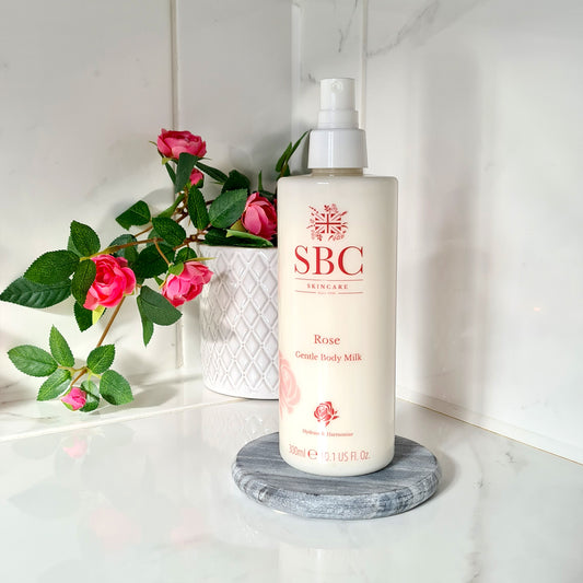 SBC Skincare's Rose Gentle Body Milk on a marble bathroom counter 