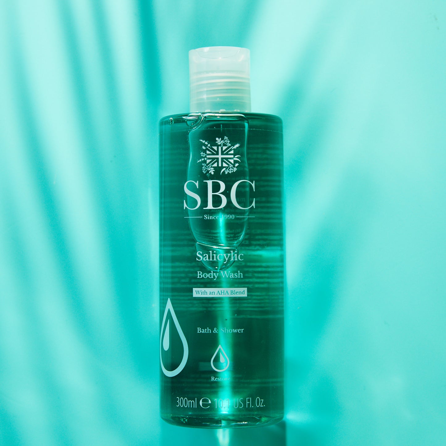 Salicylic Body Wash on a blue background with natural light 