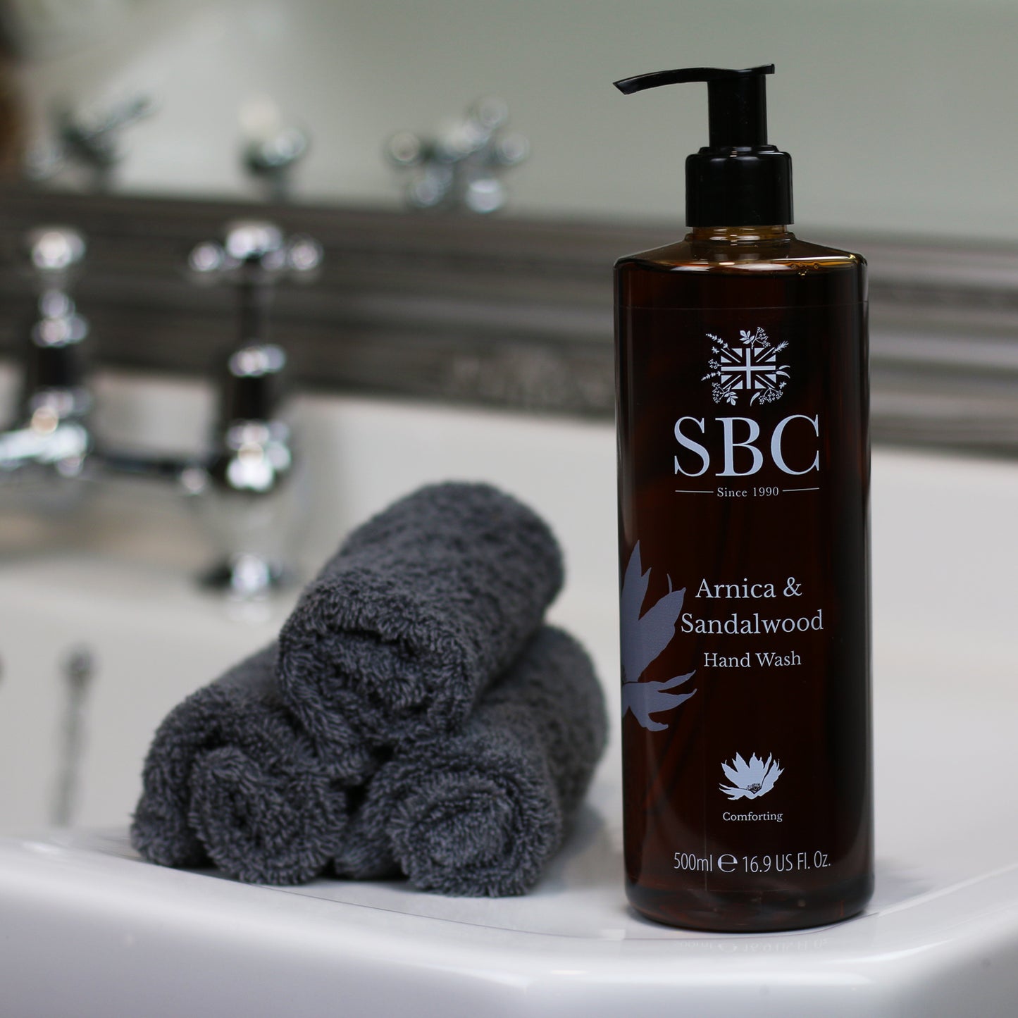 Arnica & Sandalwood Hand Wash on a sink