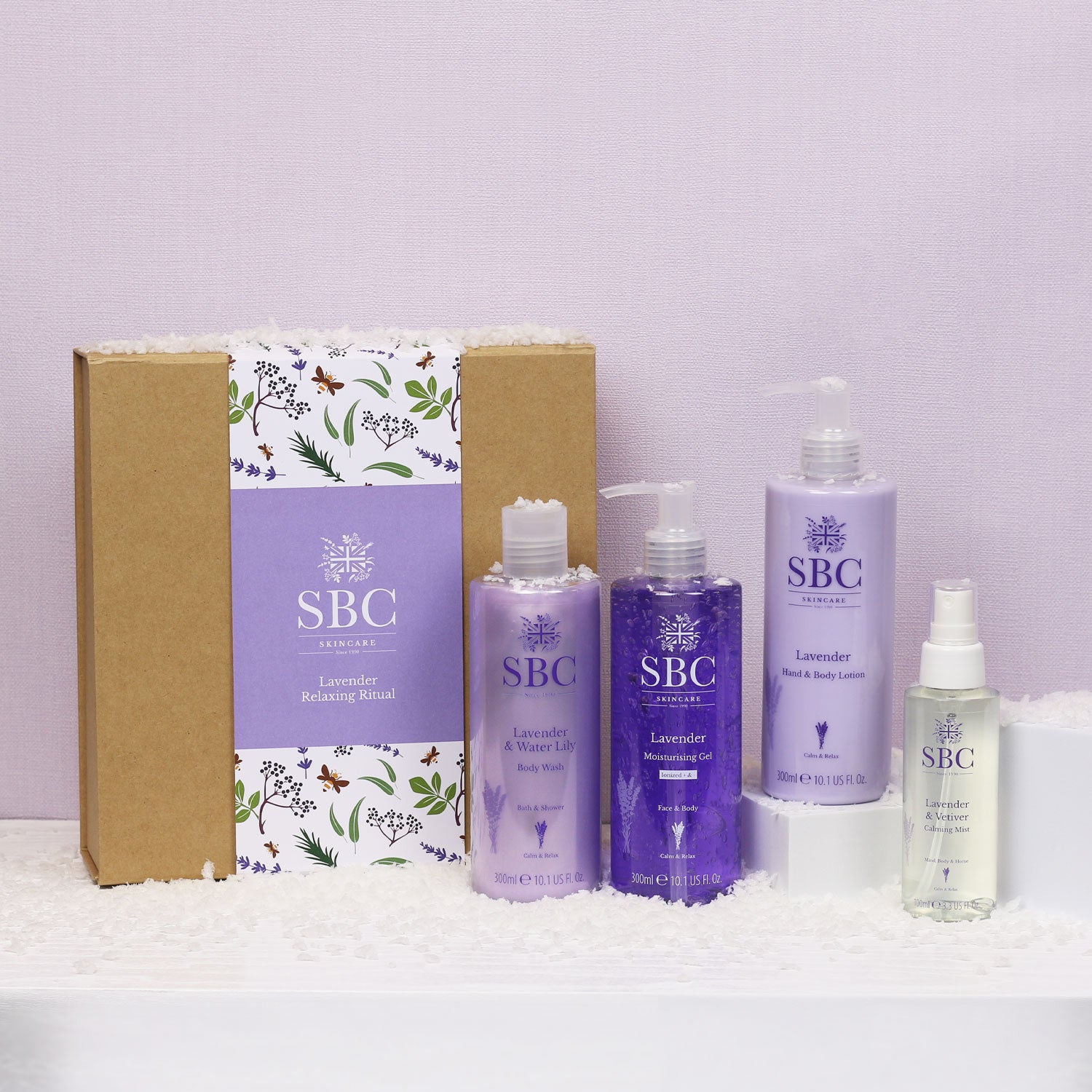 SBC Skincare’s Lavender Relaxing Ritual on a purple background with faux snow