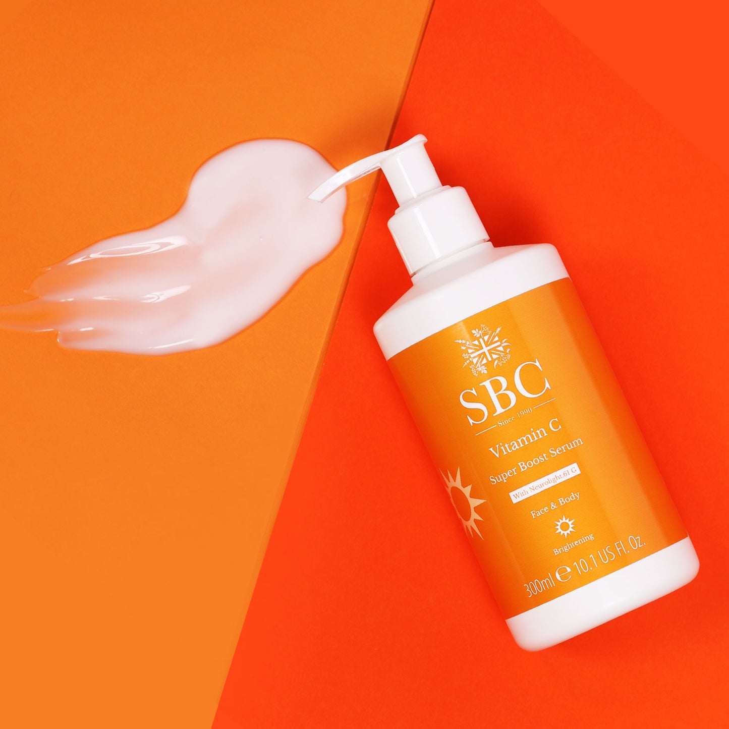 Vitamin C Super Boost Serum on an orange and red background 